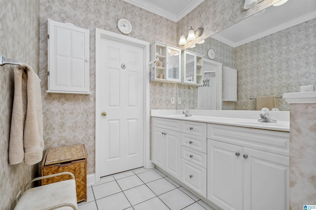 full bath featuring a sink, double vanity, ornamental molding, tile patterned flooring, and wallpapered walls