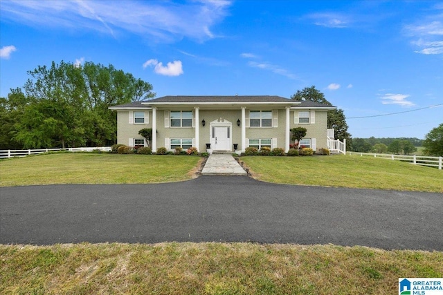 1993 County Highway 38, Horton, AL 35980 - split foyer home featuring fence and a front yard