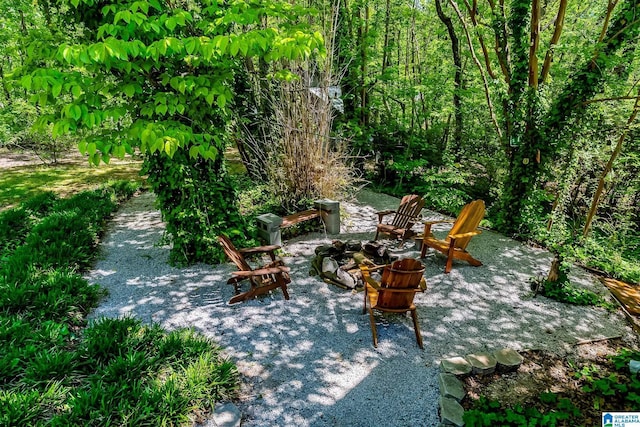 view of patio / terrace featuring a fire pit