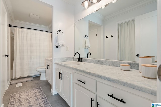 bathroom with vanity, toilet, ornamental molding, and curtained shower