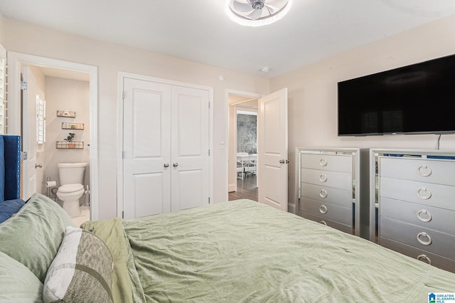 bedroom featuring connected bathroom and a closet