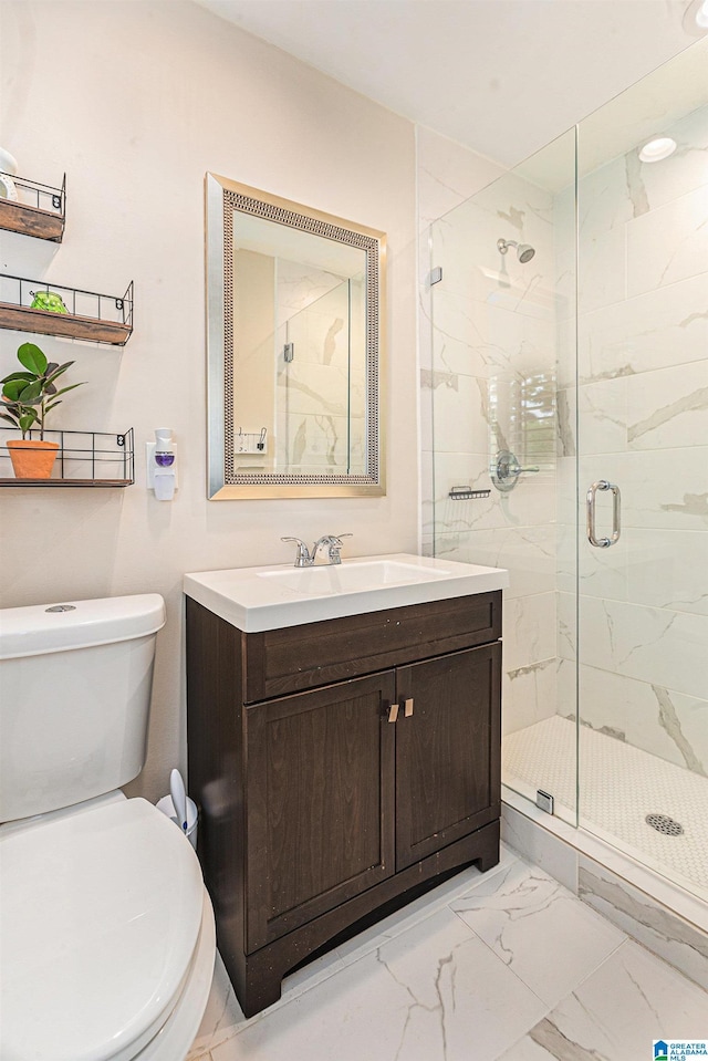 bathroom with a marble finish shower, toilet, vanity, and marble finish floor