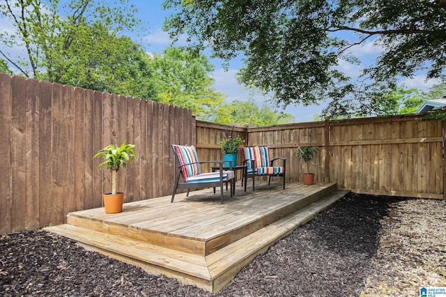 deck featuring fence private yard