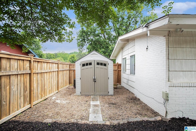 view of shed featuring a fenced backyard