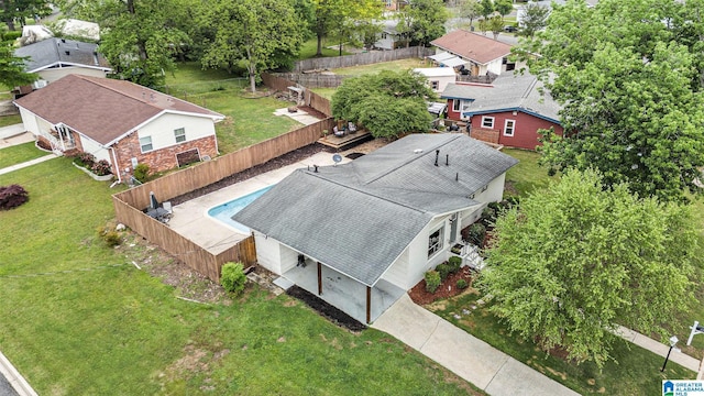 birds eye view of property with a residential view