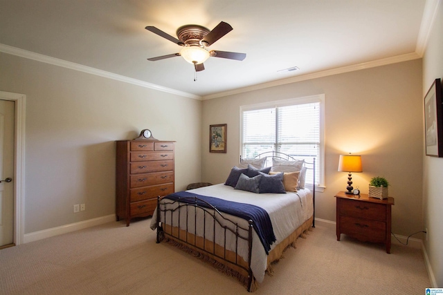 bedroom with light colored carpet, crown molding, baseboards, and a ceiling fan