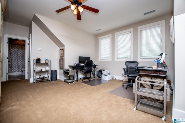 office area with ceiling fan, visible vents, and carpet