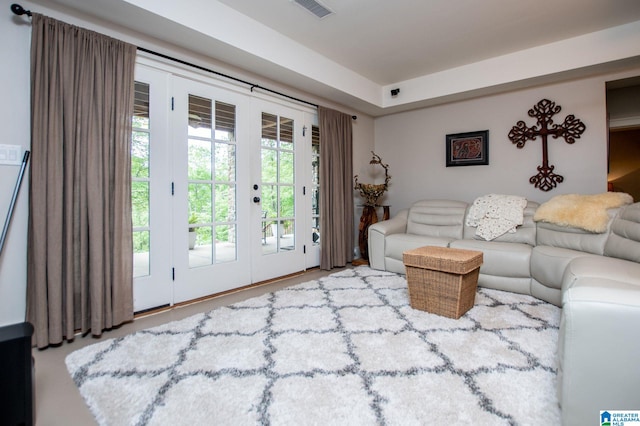 living room with french doors and visible vents