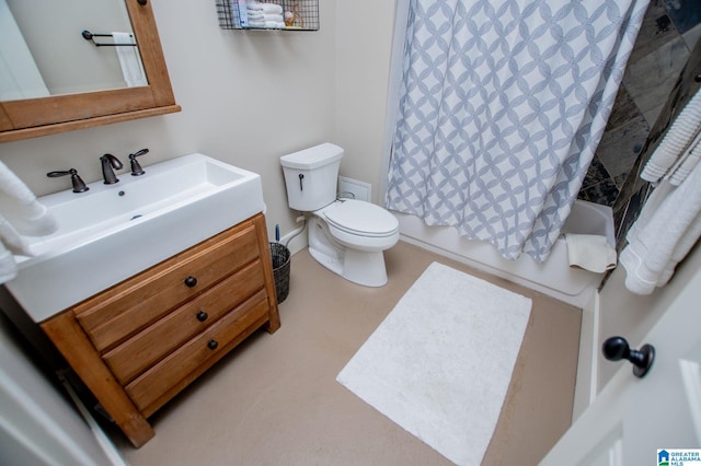 bathroom with toilet, shower / bath combo, and vanity