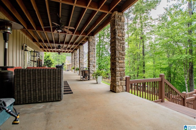 view of patio featuring a ceiling fan
