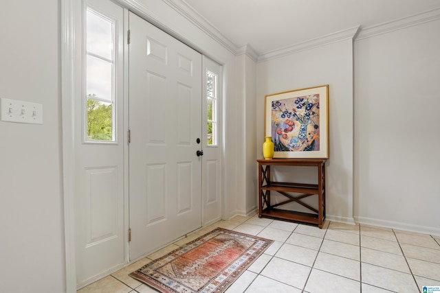 entryway featuring baseboards, ornamental molding, and light tile patterned floors