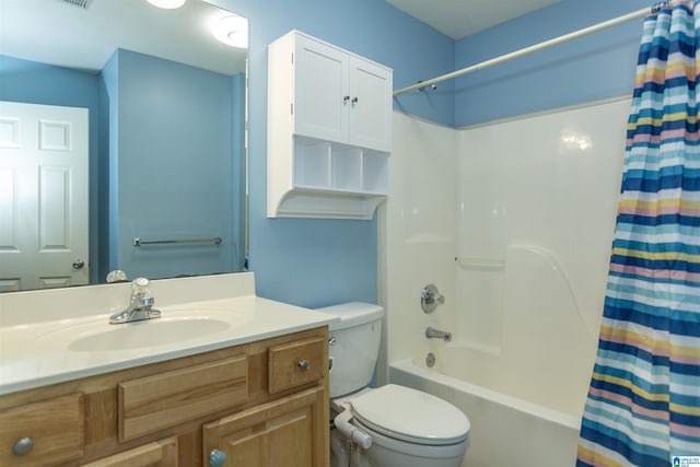 bathroom with vanity, toilet, and shower / bath combination with curtain