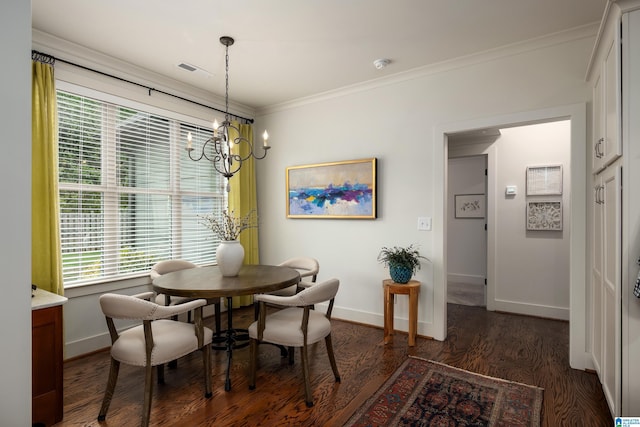 dining room featuring visible vents, a chandelier, dark wood-style floors, and baseboards