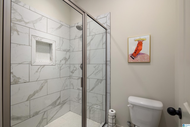 full bathroom with toilet and a stall shower