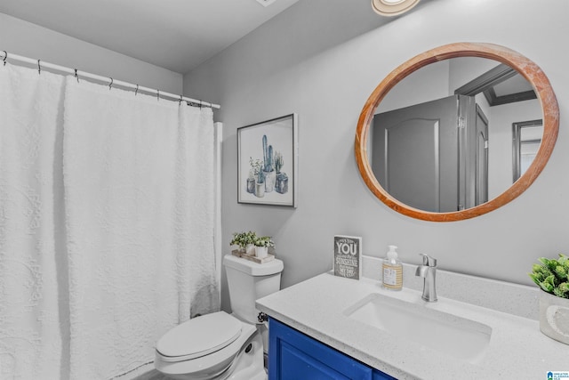 full bathroom with vanity and toilet
