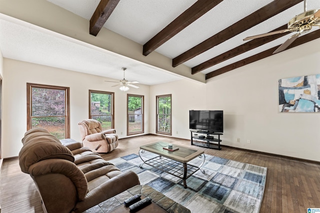 108 Dee Hendrix Rd, Hueytown, AL 35023 - living room featuring wood finished floors, vaulted ceiling with beams, a ceiling fan, and baseboards