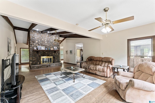 108 Dee Hendrix Rd, Hueytown, AL 35023 - living area with beamed ceiling, wood finished floors, a stone fireplace, and ceiling fan