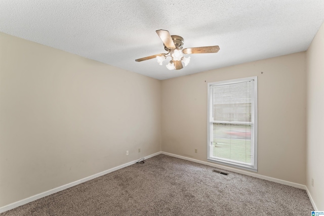 108 Dee Hendrix Rd, Hueytown, AL 35023 - carpeted spare room with ceiling fan, baseboards, a textured ceiling, and visible vents