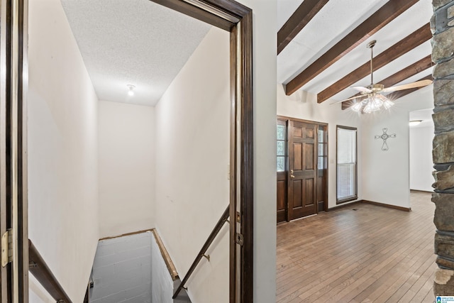 108 Dee Hendrix Rd, Hueytown, AL 35023 - entrance foyer with a textured ceiling, baseboards, beamed ceiling, a ceiling fan, and hardwood / wood-style flooring