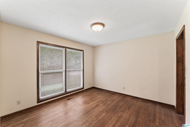 108 Dee Hendrix Rd, Hueytown, AL 35023 - unfurnished room featuring hardwood / wood-style floors, baseboards, and visible vents