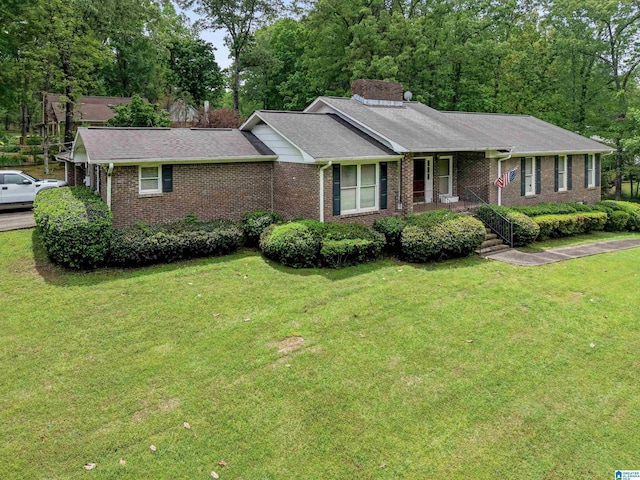 108 Dee Hendrix Rd, Hueytown, AL 35023 - ranch-style home with a front lawn, brick siding, and a porch