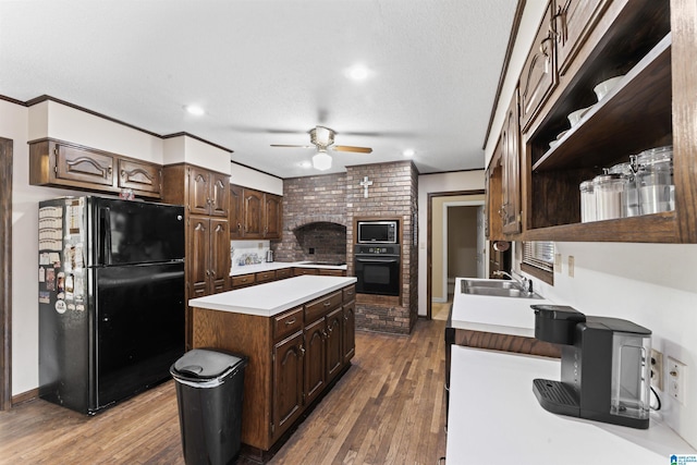 108 Dee Hendrix Rd, Hueytown, AL 35023 - kitchen with open shelves, a ceiling fan, a sink, dark brown cabinetry, and black appliances