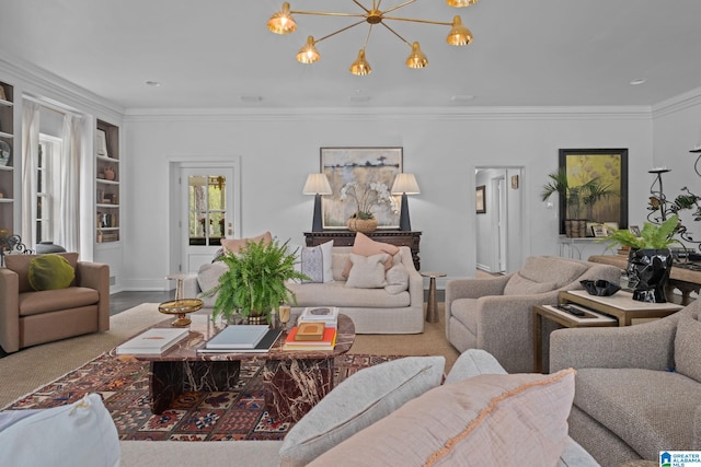 living area featuring a chandelier and crown molding