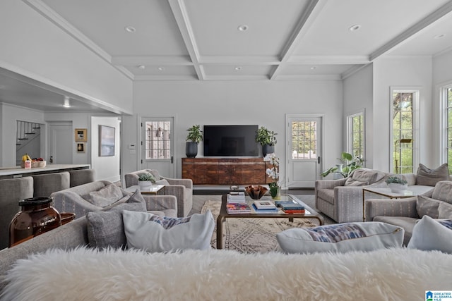 living room featuring recessed lighting, coffered ceiling, and beamed ceiling