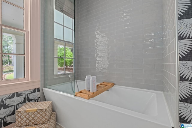 bathroom with a freestanding bath