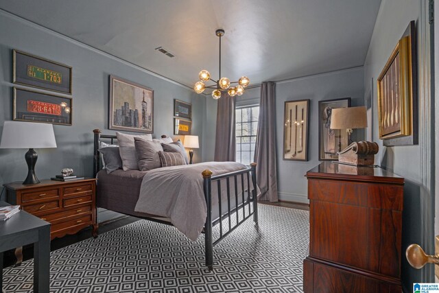 bedroom featuring an inviting chandelier, visible vents, and baseboards
