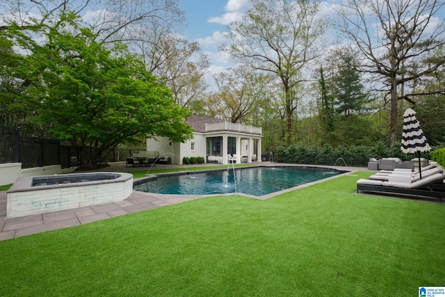 outdoor pool featuring a lawn, a patio area, and an outdoor hangout area