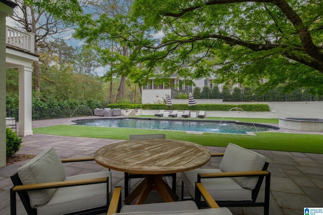 view of swimming pool with a patio, an outdoor living space, a fenced in pool, and fence