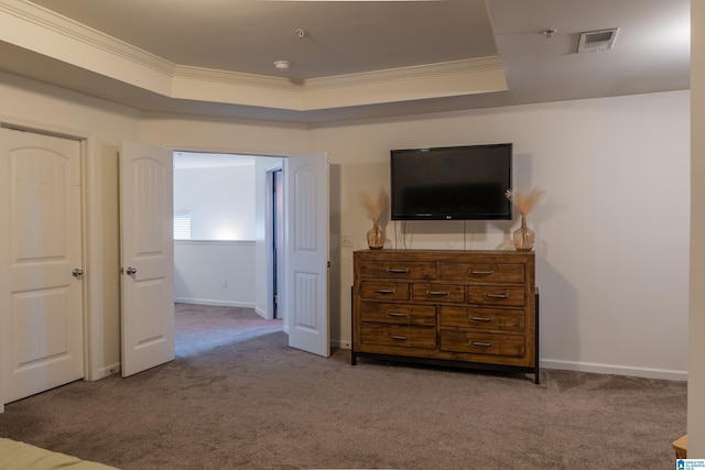 bedroom with visible vents, ornamental molding, carpet flooring, and baseboards