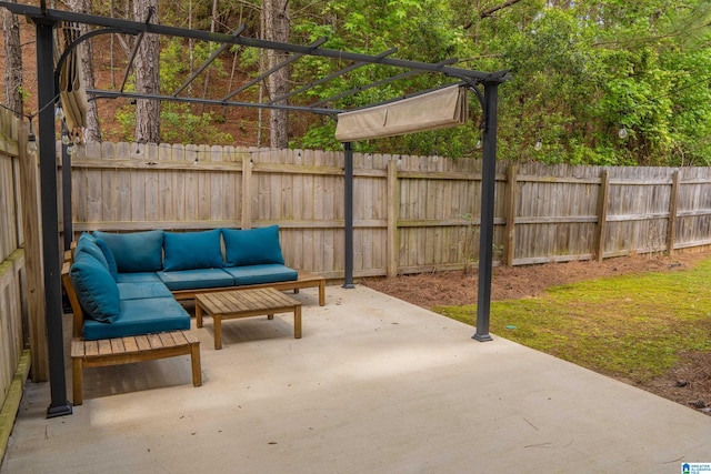 view of patio / terrace featuring outdoor lounge area and fence