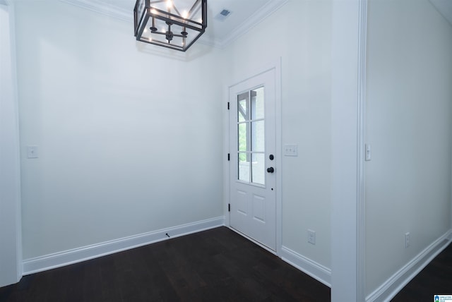 doorway with crown molding, a chandelier, visible vents, baseboards, and dark wood finished floors