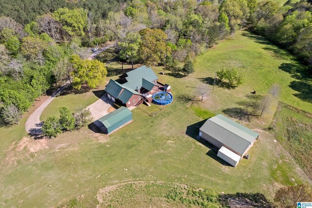 aerial view featuring a view of trees
