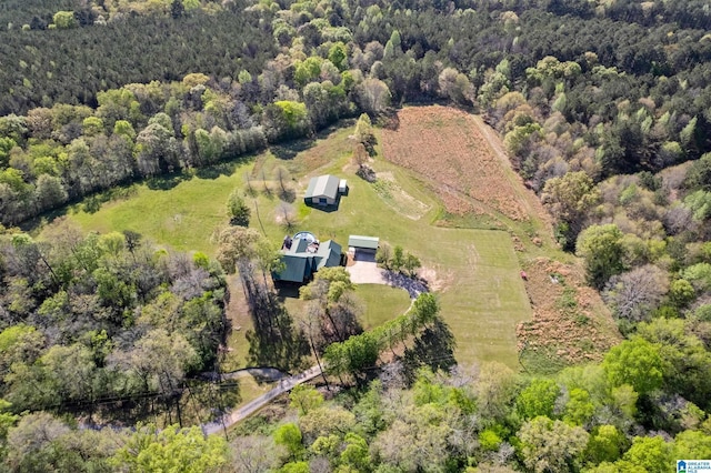 drone / aerial view with a rural view and a view of trees