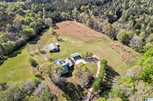 birds eye view of property with a rural view