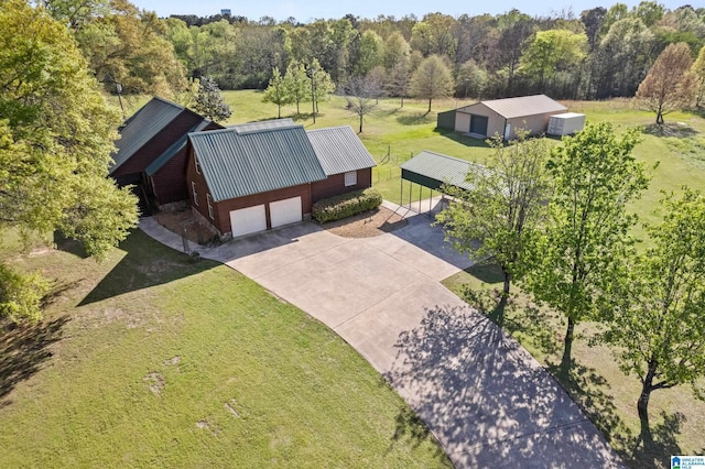 aerial view featuring a view of trees