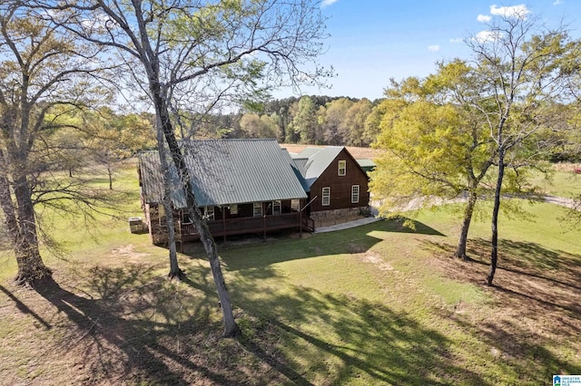 bird's eye view featuring a wooded view