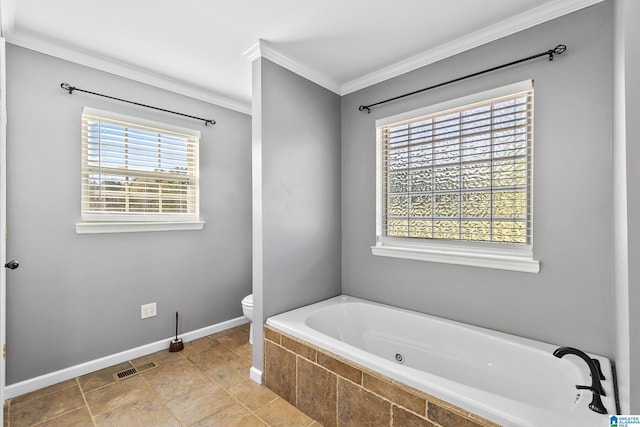 full bath featuring visible vents, toilet, a bath, crown molding, and baseboards