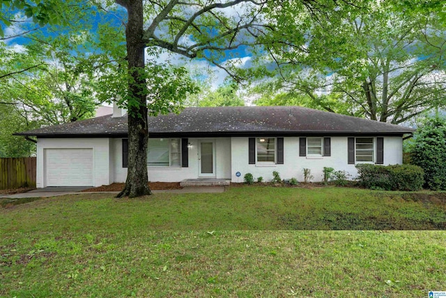 2005 Southwood Rd, Vestavia Hills, AL 35216 - single story home with brick siding, a front lawn, driveway, and a garage