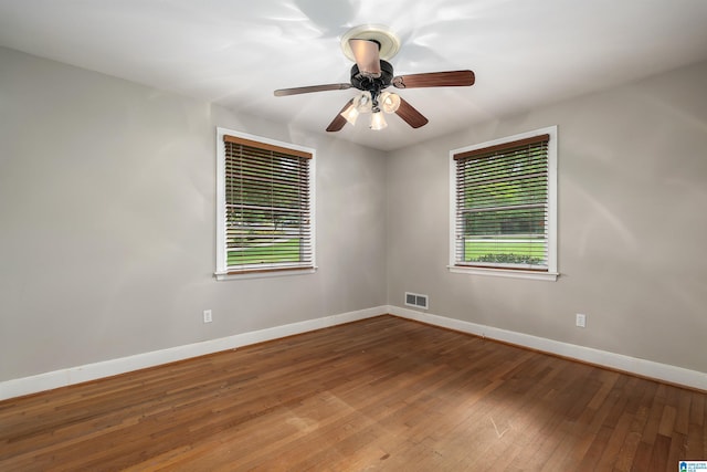 2005 Southwood Rd, Vestavia Hills, AL 35216 - spare room featuring baseboards, visible vents, a wealth of natural light, and hardwood / wood-style floors