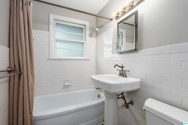 2005 Southwood Rd, Vestavia Hills, AL 35216 - full bathroom with toilet, shower / bath combination with curtain, wainscoting, and tile walls