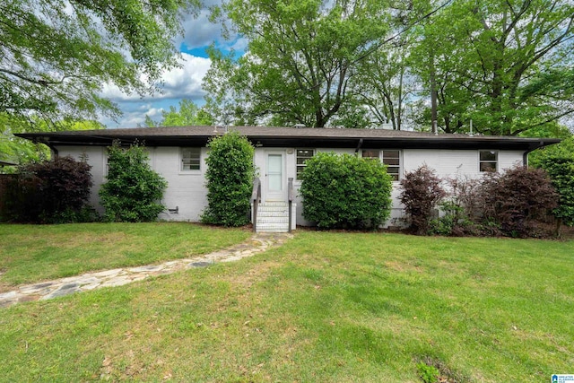 2005 Southwood Rd, Vestavia Hills, AL 35216 - view of front of home with entry steps and a front yard