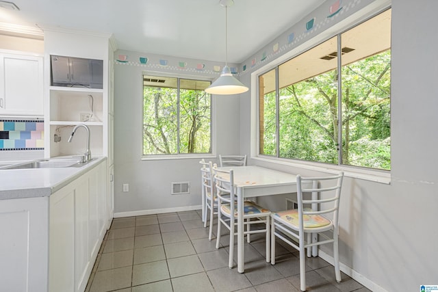 2725 Shades Crest Rd, Vestavia Hills, AL 35216 - dining room featuring light tile patterned flooring, baseboards, and visible vents