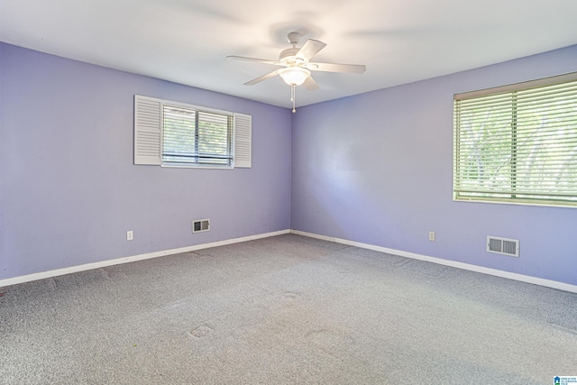 2725 Shades Crest Rd, Vestavia Hills, AL 35216 - carpeted spare room with visible vents, baseboards, and a ceiling fan