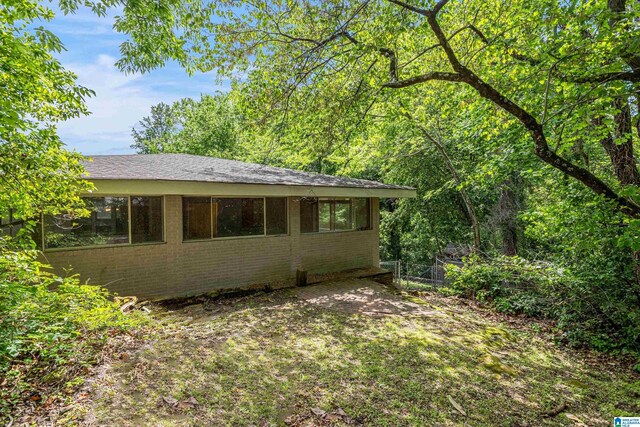 2725 Shades Crest Rd, Vestavia Hills, AL 35216 - view of side of property featuring brick siding and fence