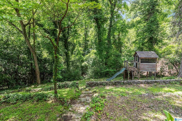 2725 Shades Crest Rd, Vestavia Hills, AL 35216 - view of yard featuring a playground and a view of trees