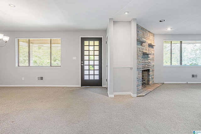 2725 Shades Crest Rd, Vestavia Hills, AL 35216 - foyer entrance featuring a wealth of natural light, visible vents, and carpet